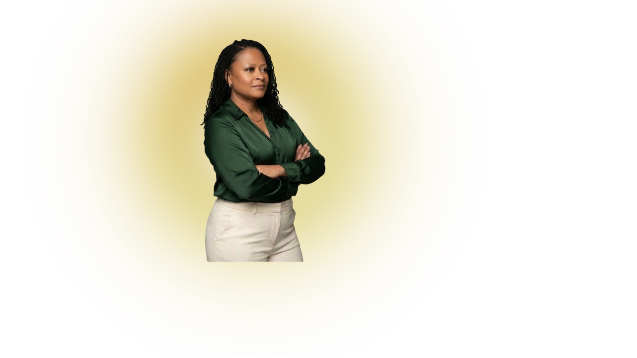 A woman with long, curly black hair stands with her arms crossed, wearing a dark green blouse and beige pants, against a colorful psychedelic background.