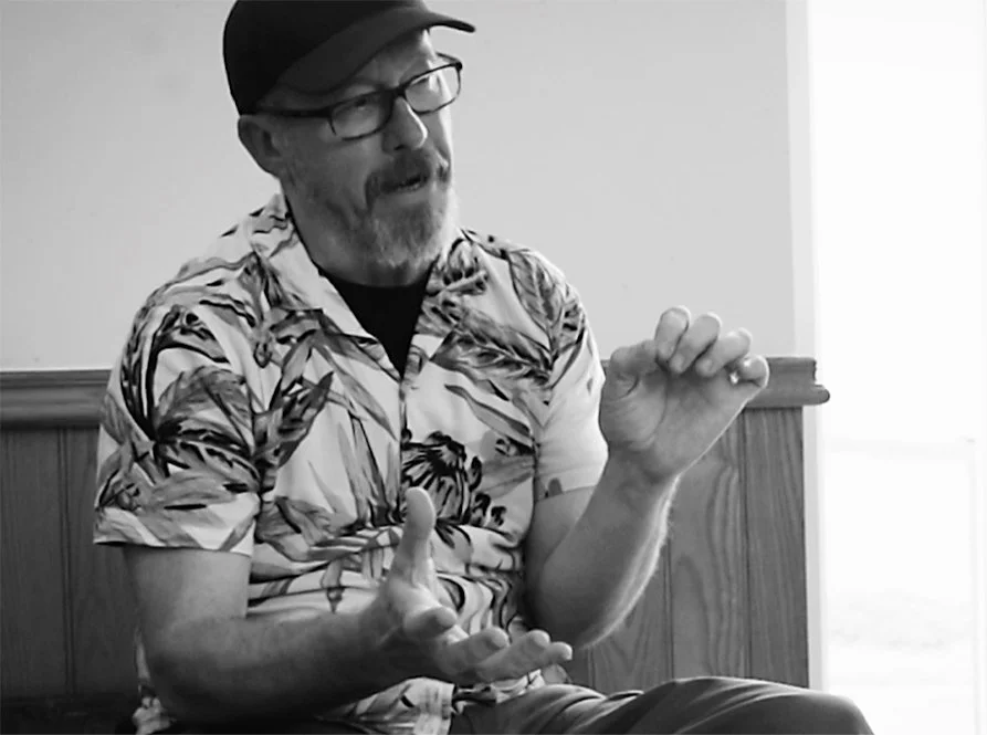 Greg chatting to camera about the song 'hold'