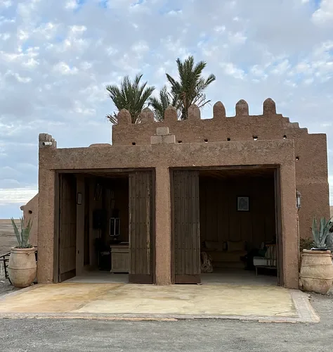 white-camel-camp-entrance-agafay-desert
