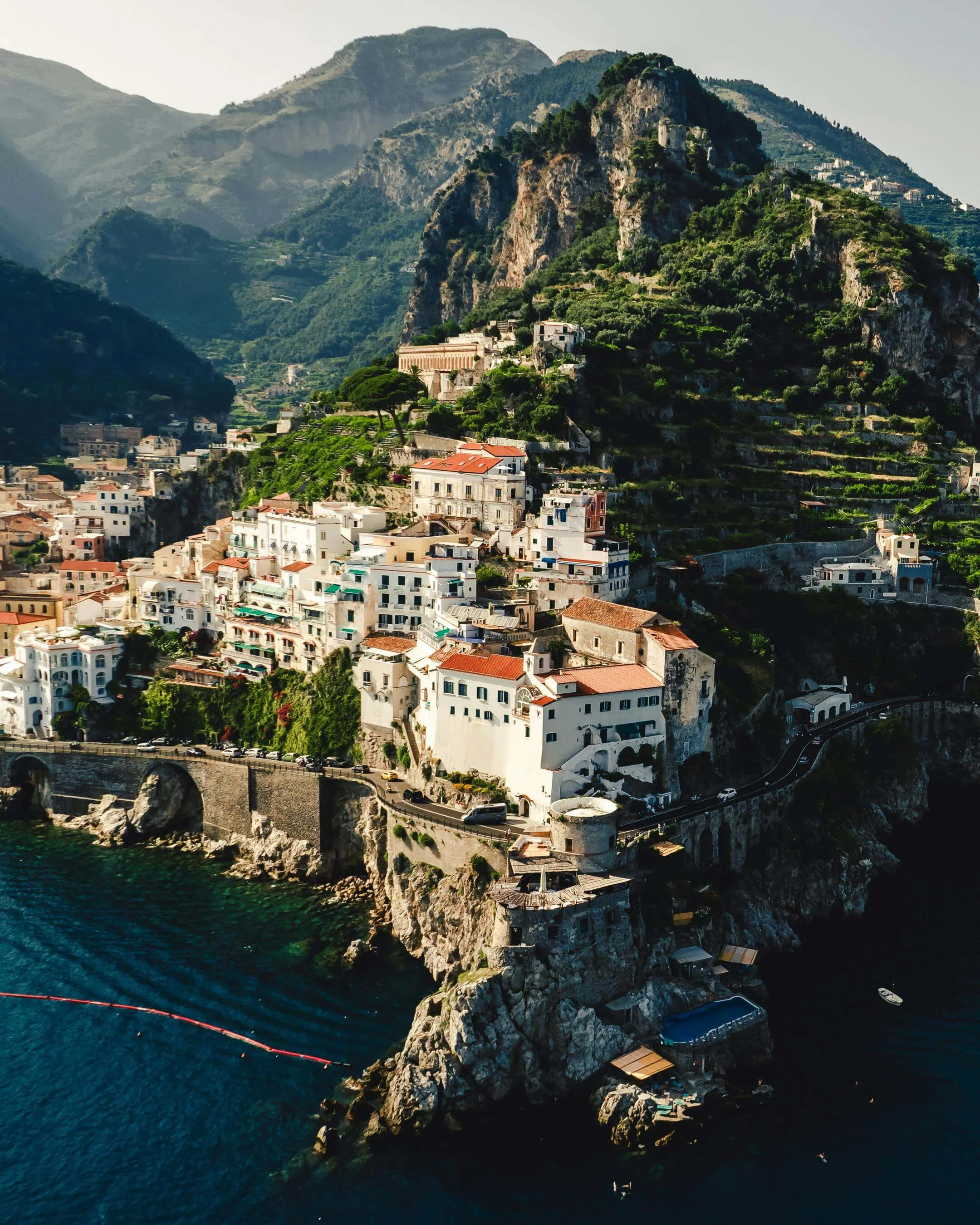 Mediterranean coastline along the Amalfi Coast during summer.