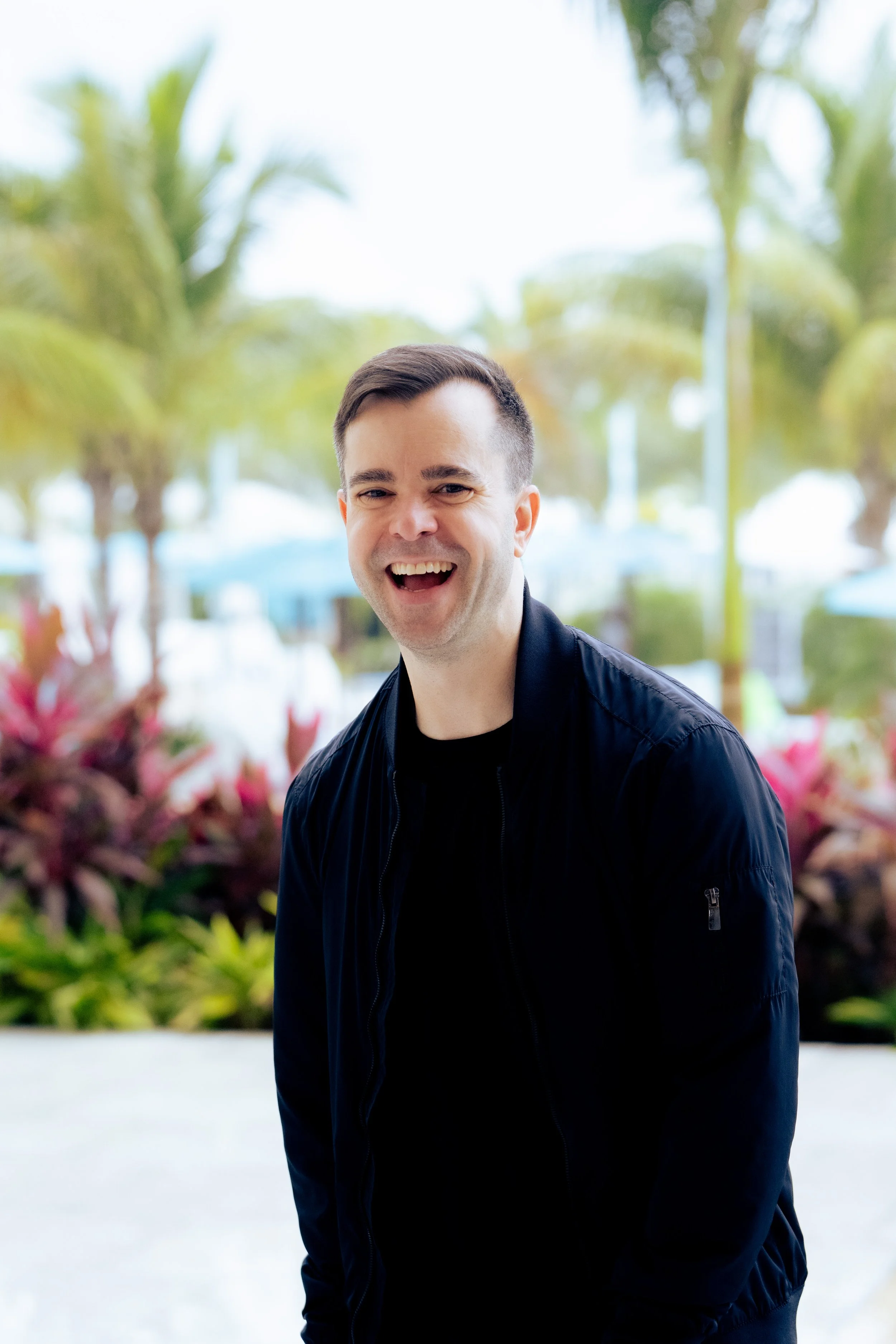 Image of Louis Monoyudis outside with tropical background