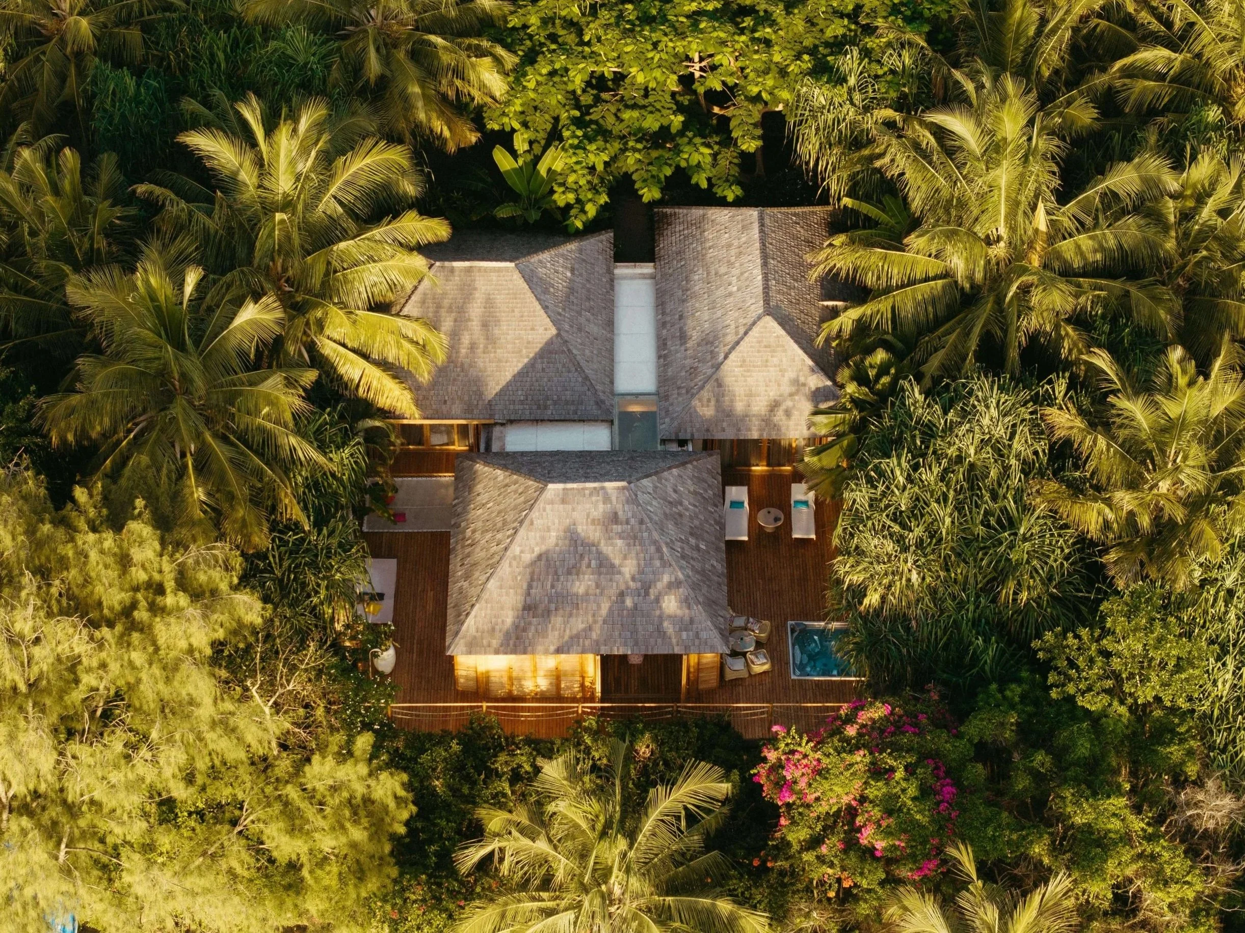 Image of tropical villa with thatched roof