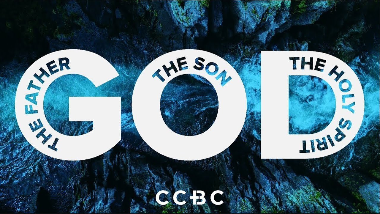 Text overlay on a background of dark blue water and rocks reads, "The Father the Son the Holy Spirit" with the initials 'CCBC' below.