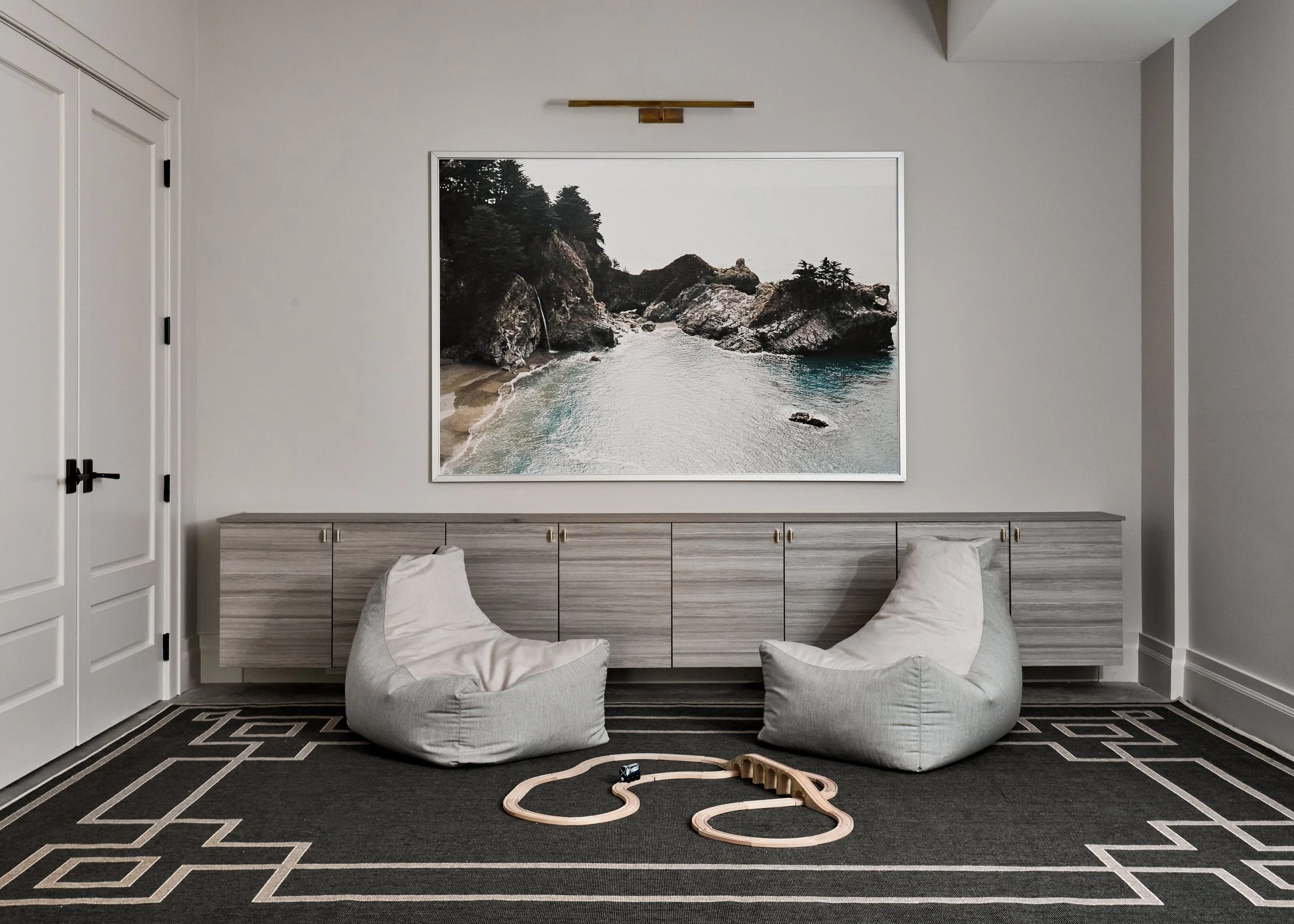 Minimalist monochrome playroom designed by Westport Connecticut interior designer Caroline Kopp