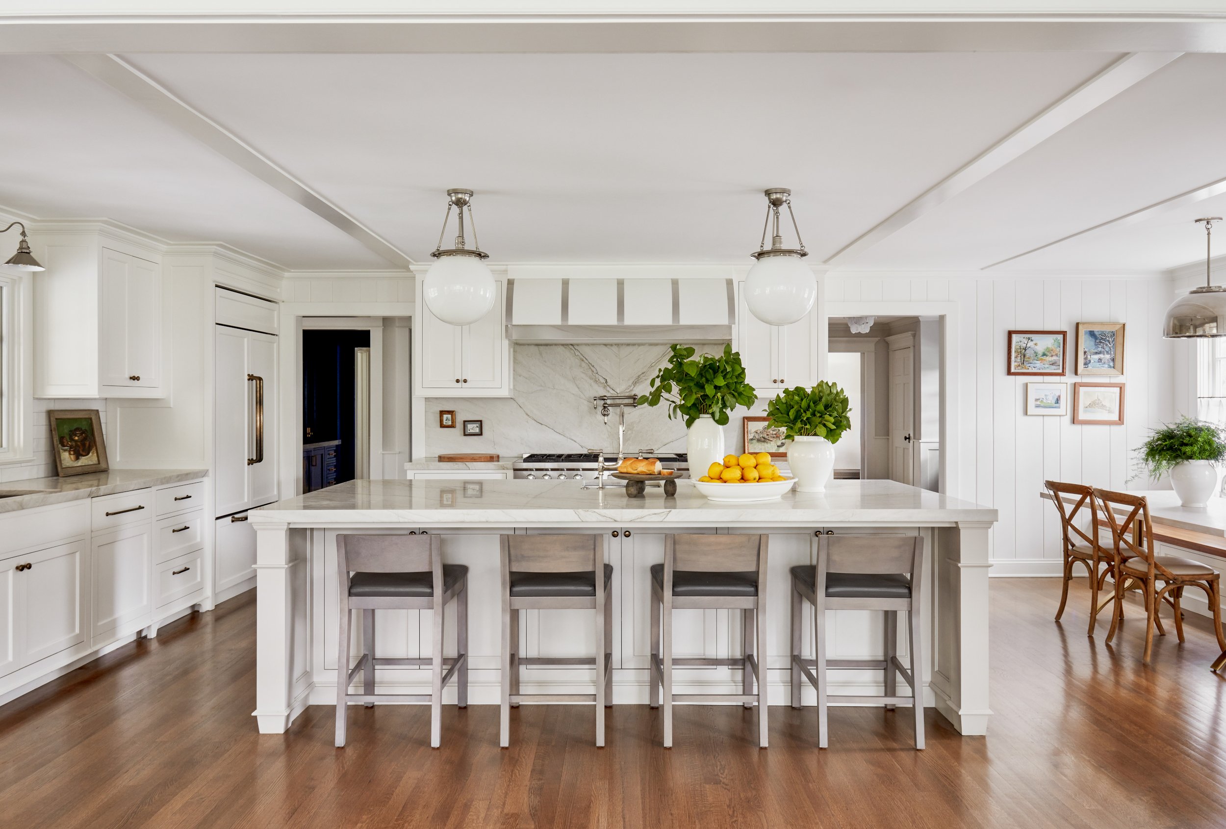 A soft grey and beige kitchen designed by Westport Connecticut interior designer Caroline Kopp