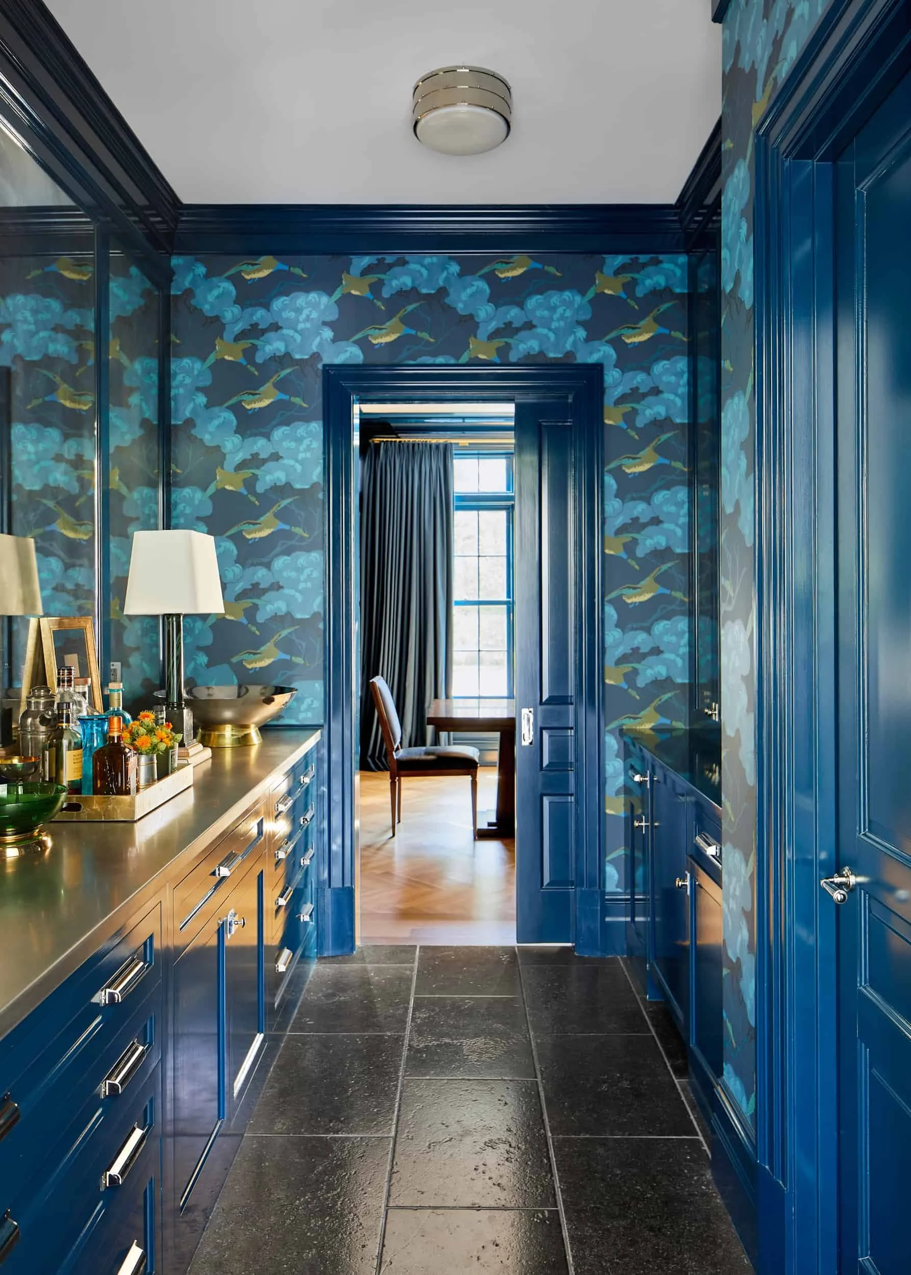 Blue lacquered butlers pantry designed by Westport Connecticut interior designer Caroline Kopp