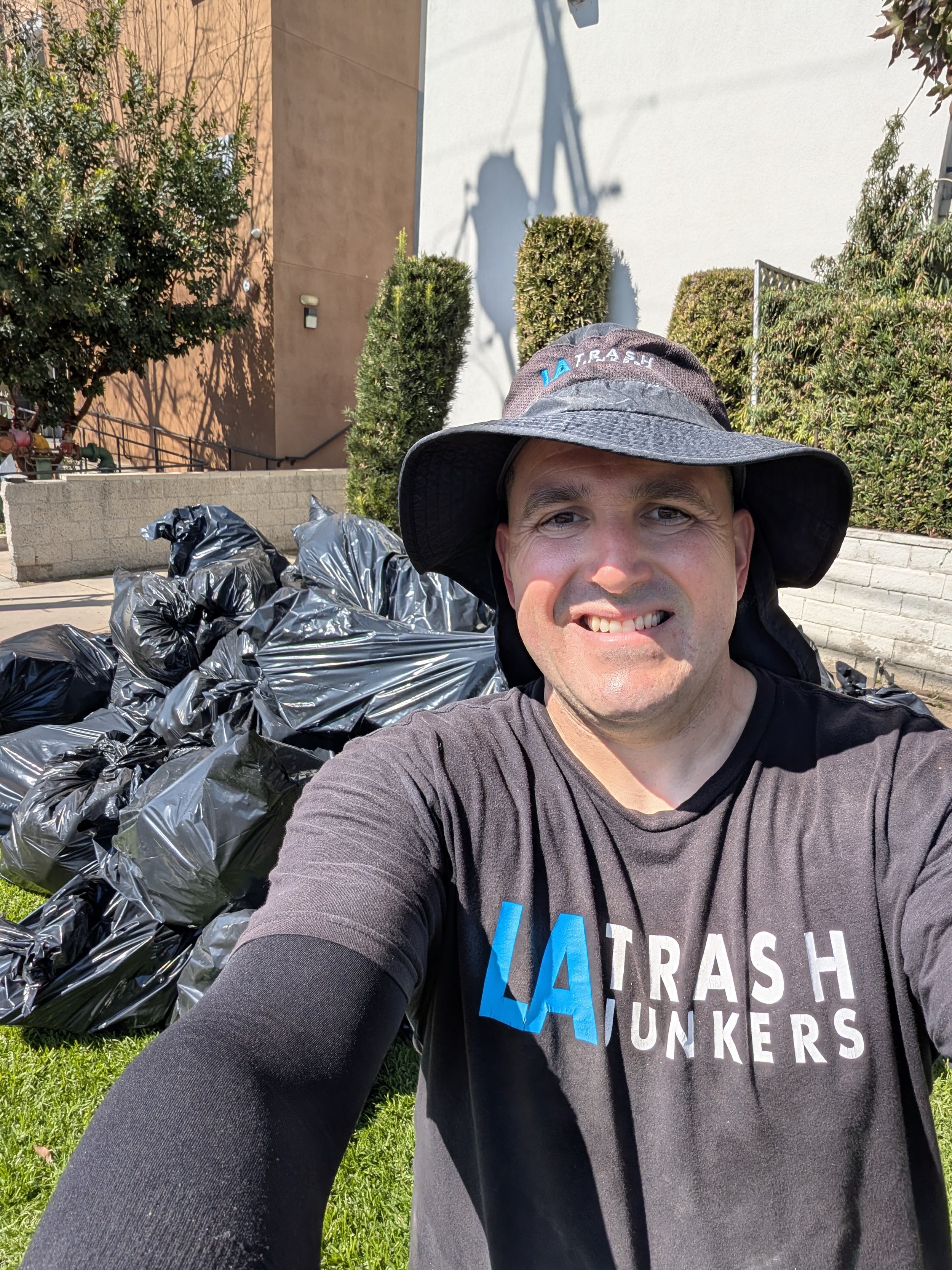 Xavier Figueroa of L.A. Trash Junkers conducting a strategic property assessment in the Los Angeles and San Gabriel Valley area.
