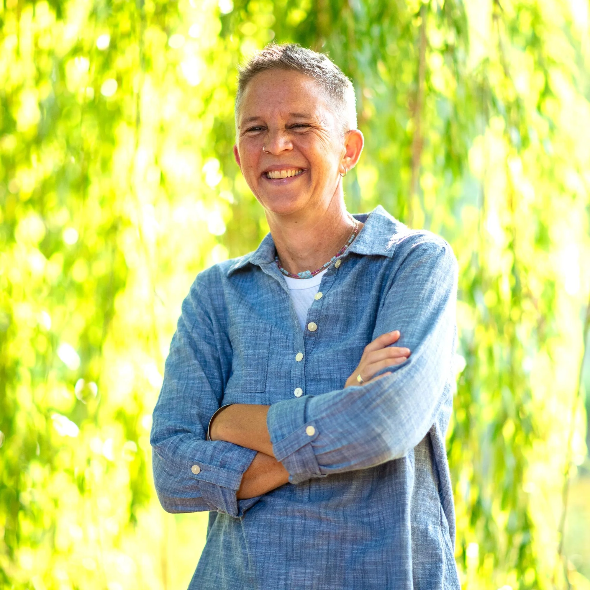 Janet smiling outdoors