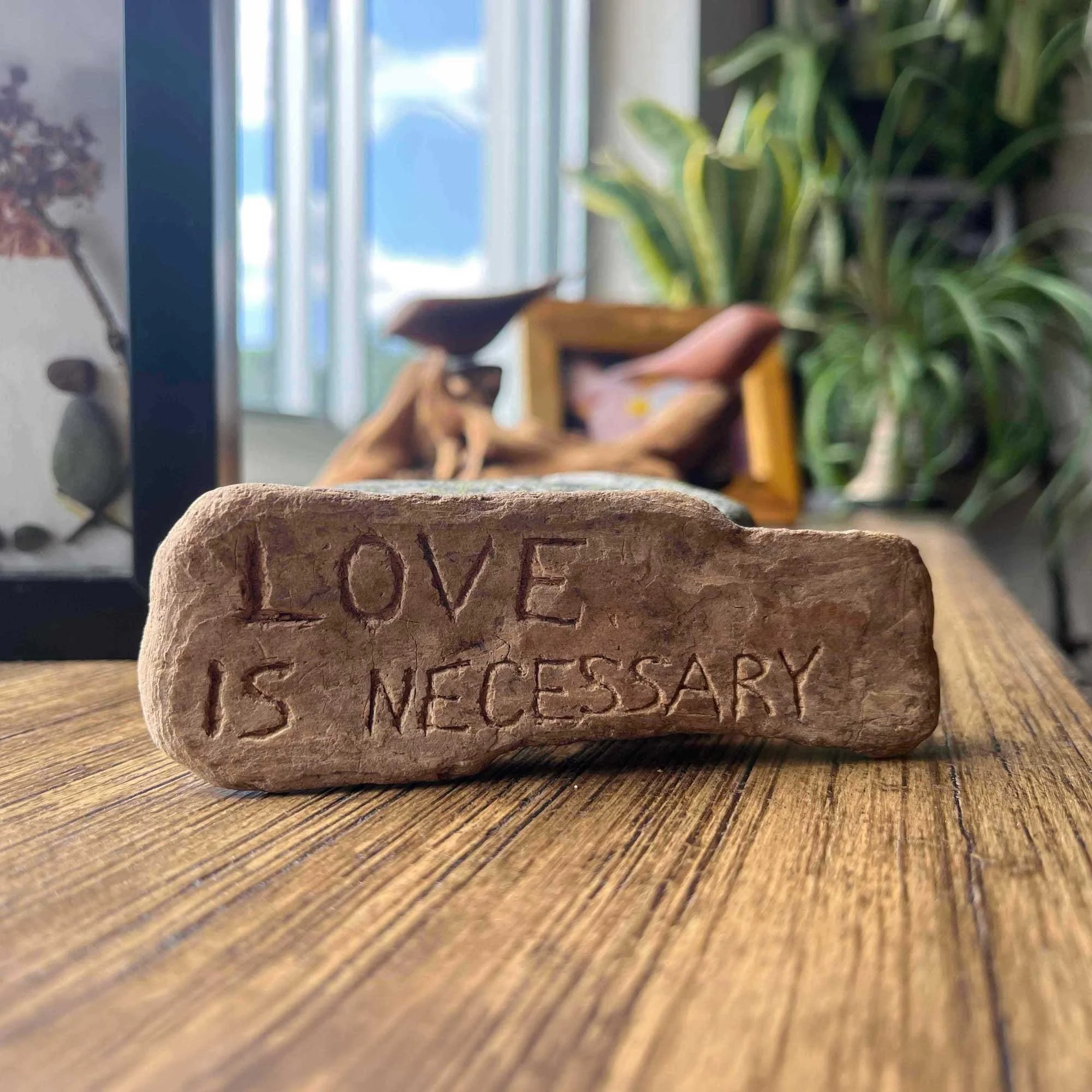 Love is necessary inscribed on a rock