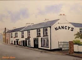 Nancy’s Bar is one of Donegal’s most famous traditional pubs, known for its warm atmosphere, live music, and fantastic food. Full of character and local charm, it’s the perfect place to enjoy fresh seafood, a cosy pint by the fire, and a true taste o