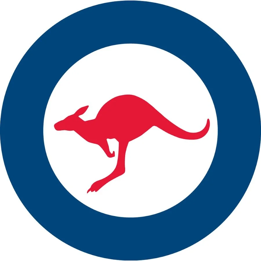A circular logo with a blue border and a white background, featuring a red kangaroo in the center.