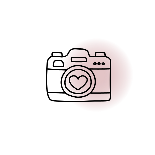 Illustration of a camera with a heart on the lens, surrounded by a pink circle.
