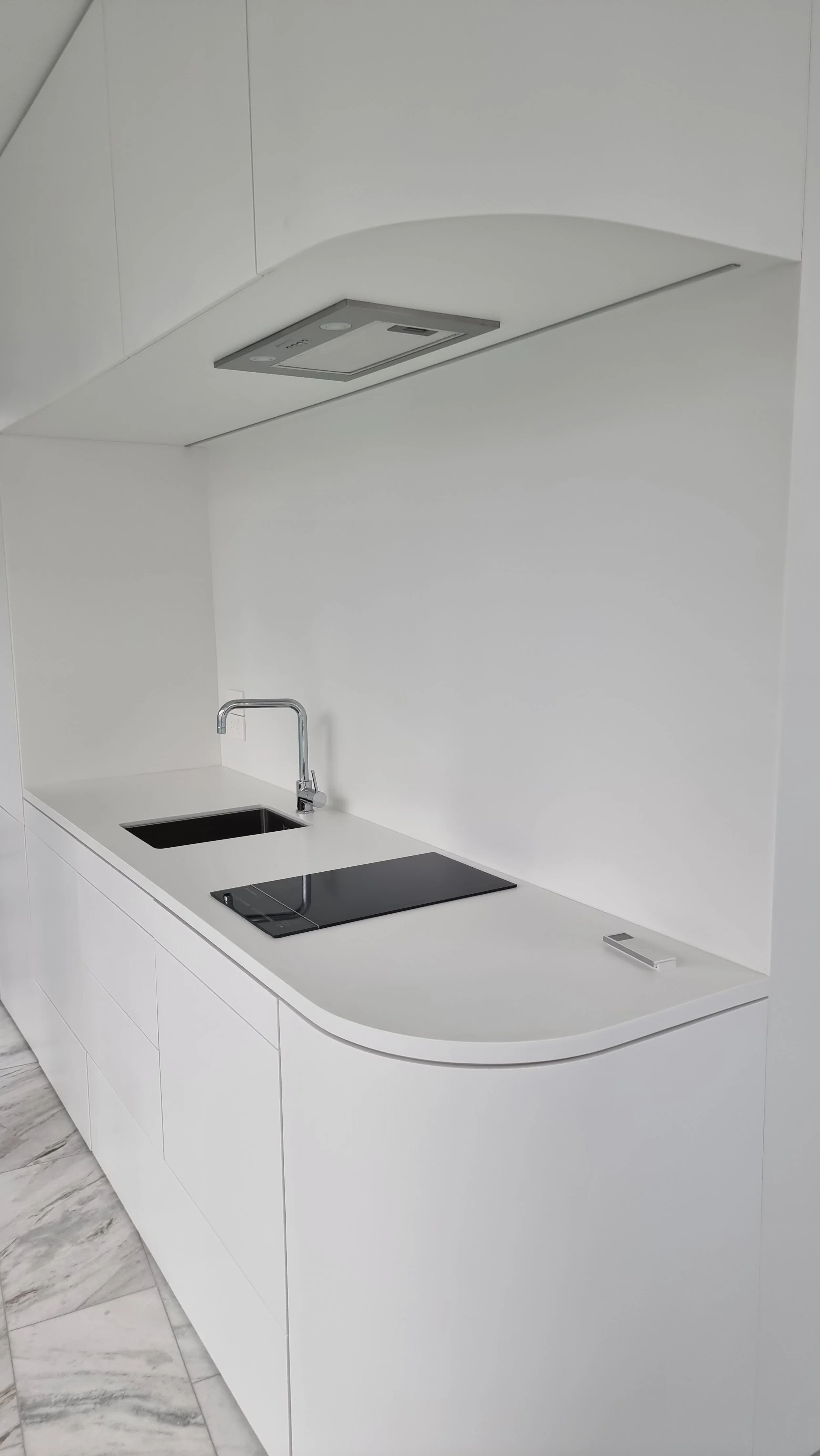 Small space kitchen with curved end.jpg