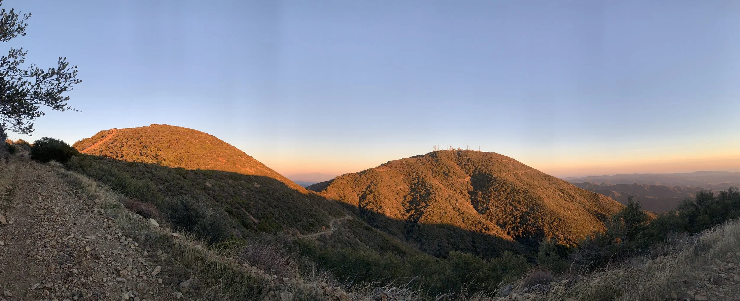 Modjeska Peak (left) and Santiago Peak (right) in the evening light. Joplin Trail descends from the saddle between the two peaks.
