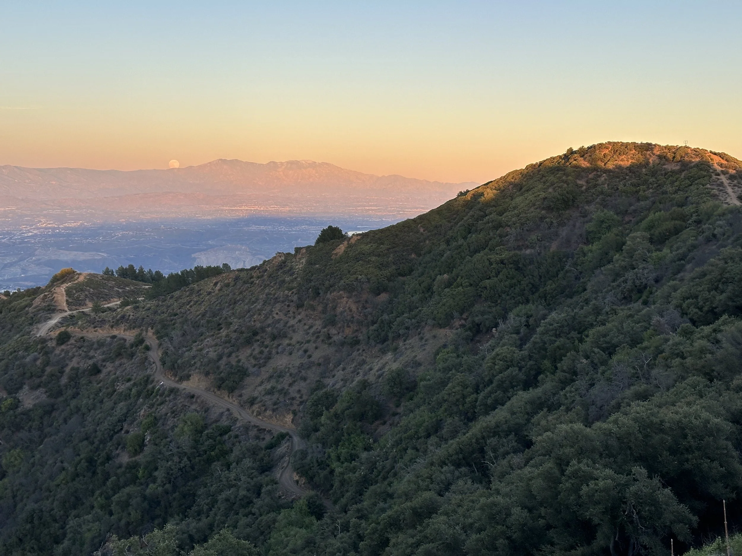 The Main Divide sneaks around the shoulder of Pleasant's Peak. The moon rises over San Gorgonio in the distant San Bernadinos.