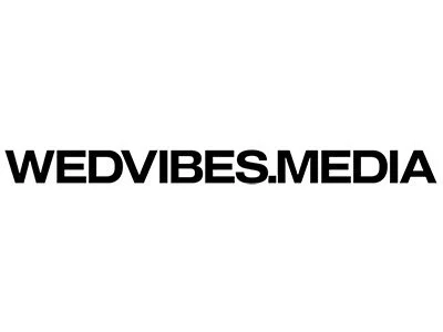 Logo with the text 'WEDVIBES.MEDIA' in black capital letters on a white background.
