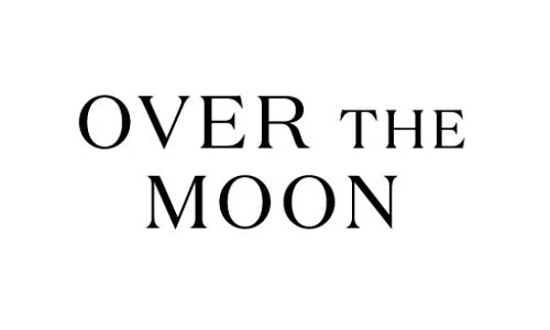 Text saying 'OVER THE MOON' in black capital letters on a white background.
