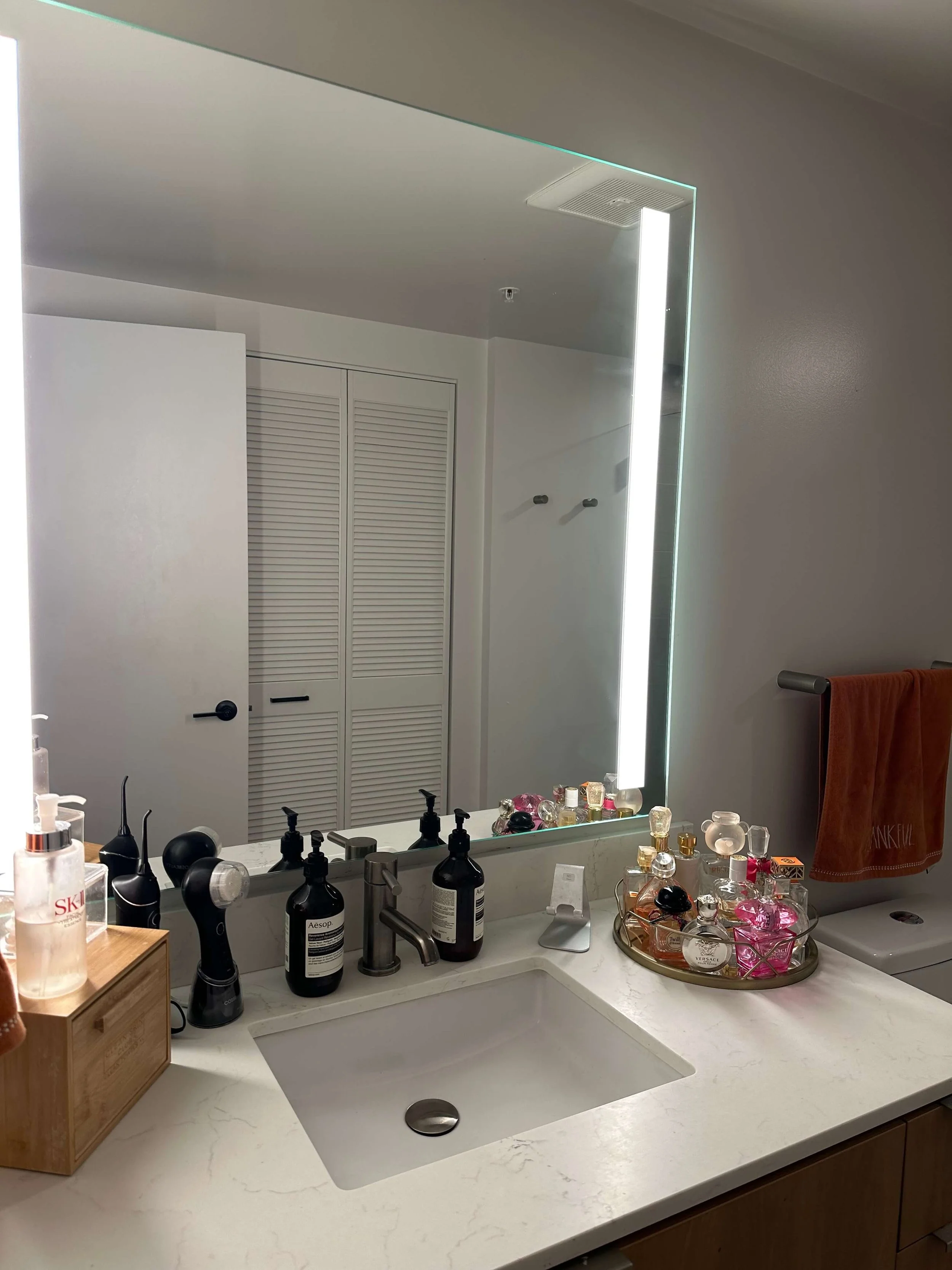Pristine bathroom with spotless mirrors and fixtures Soma SF cleaning service