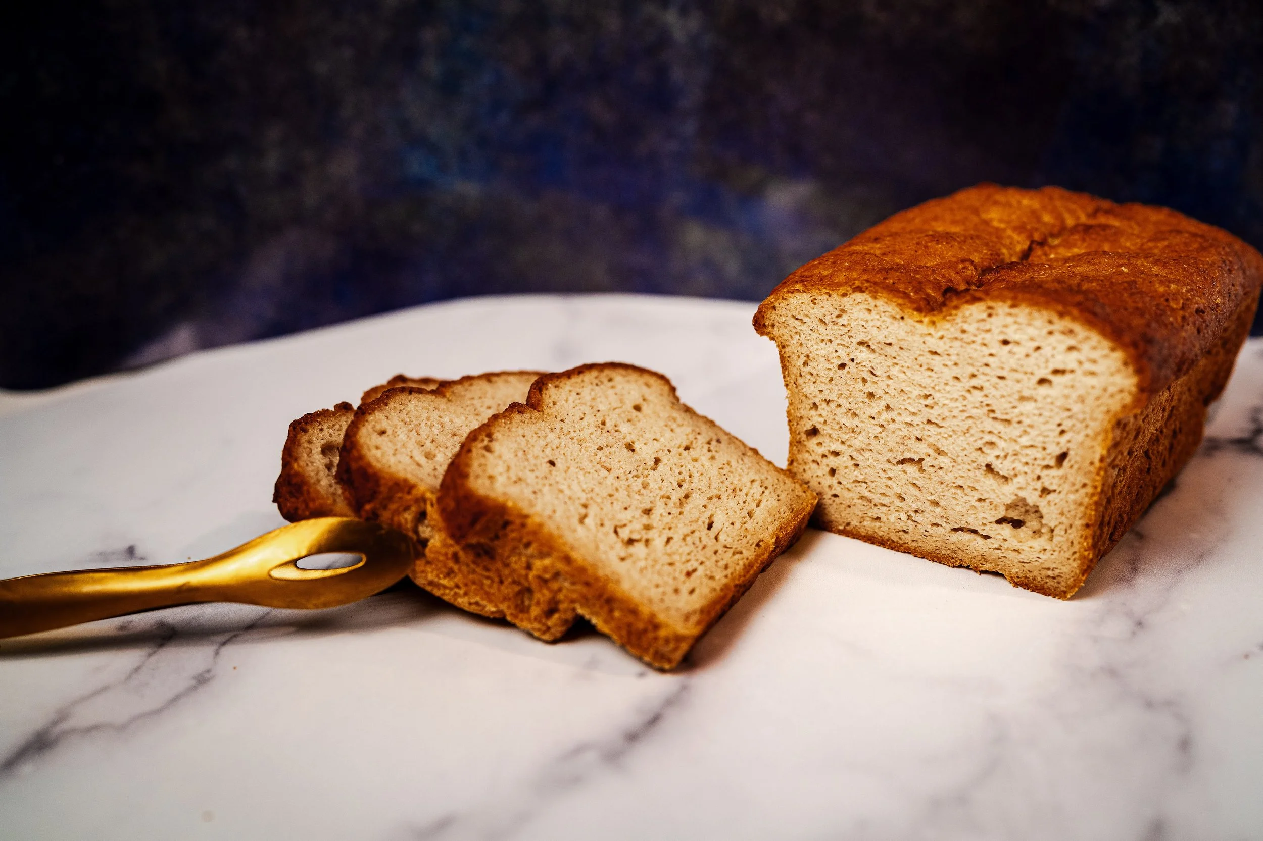 Sliced Vegan Brioche with Tongs.jpg