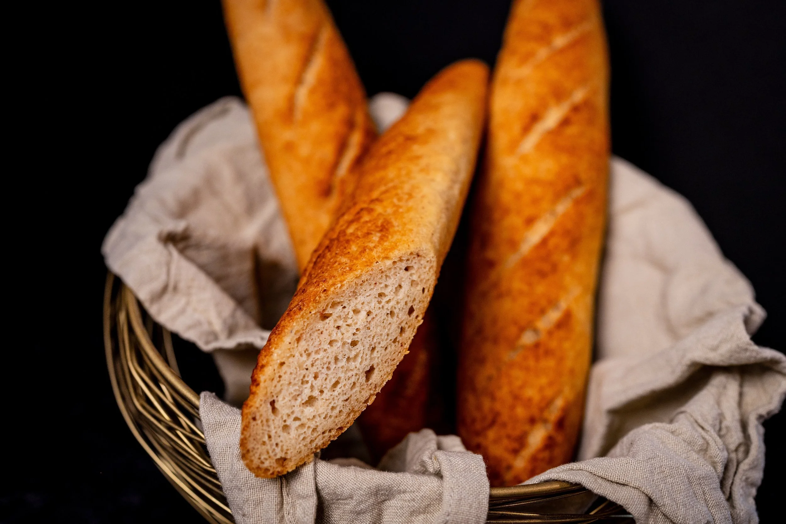Closeup of Cut Baguette in Basket 2.jpg