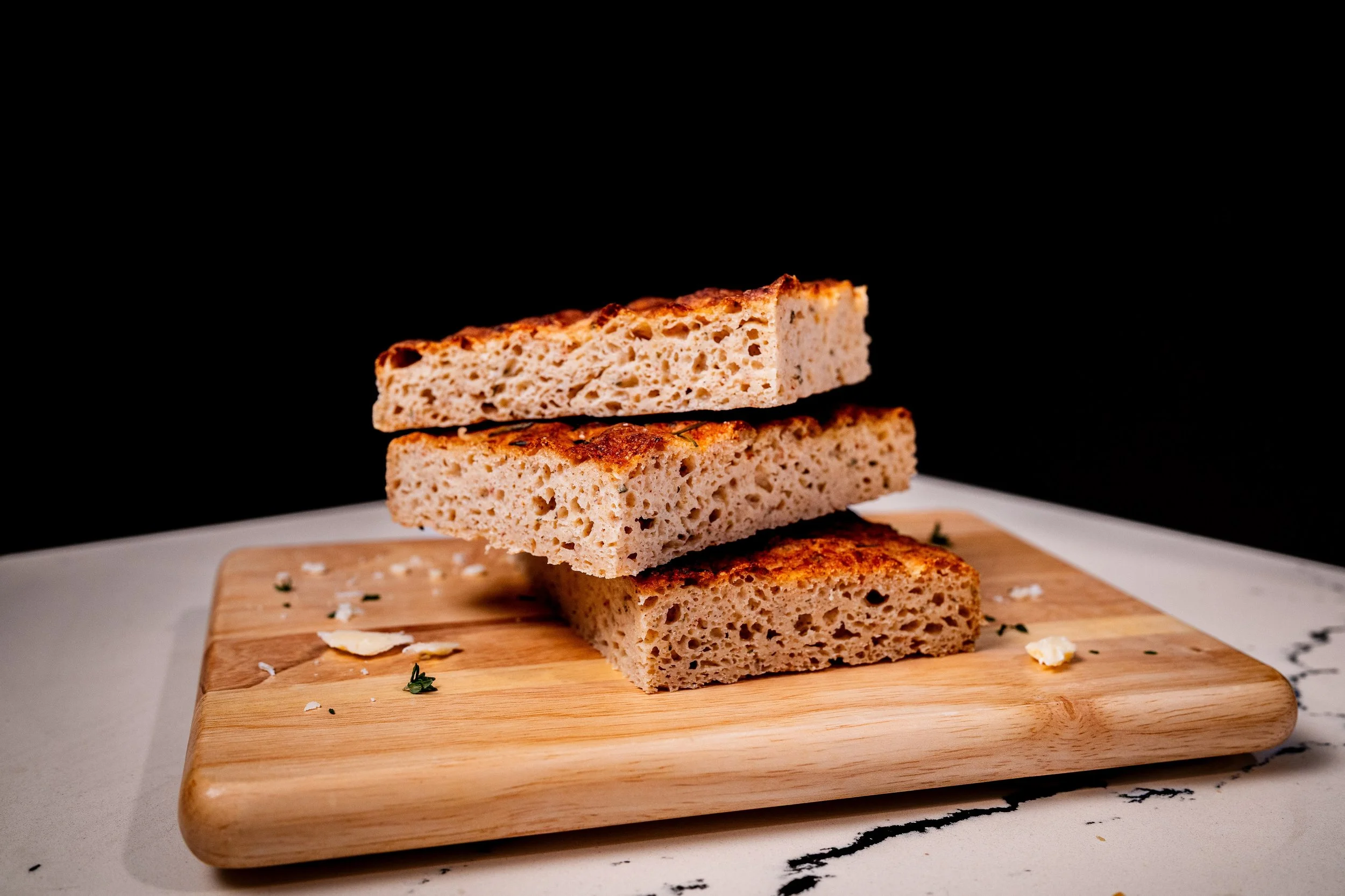 Garlic Herb Parm Focaccia Slices Stacked.jpg