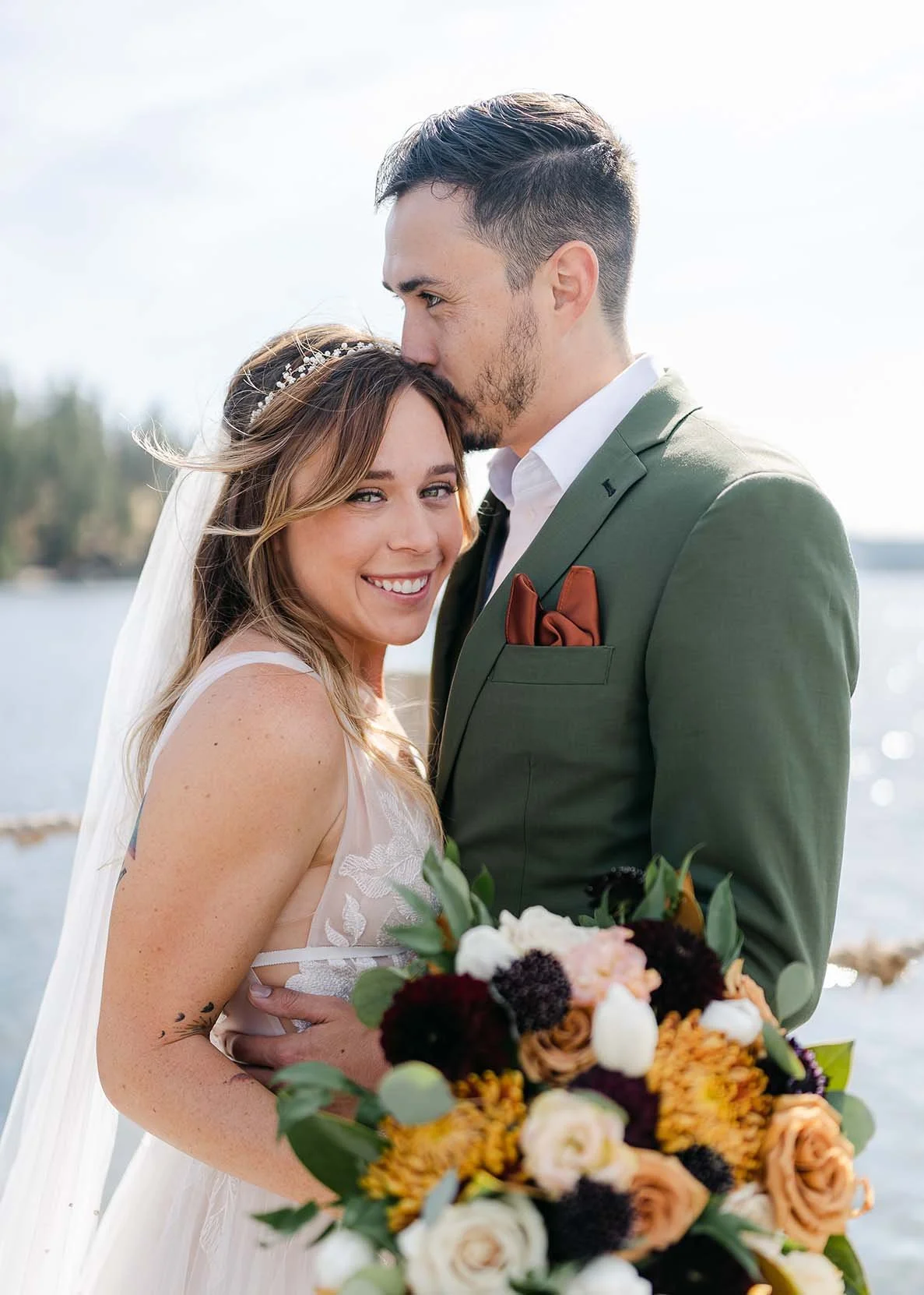 Gorgeous bride posing with new husband - Wedding hair and makeup done by Terri Reece Studios