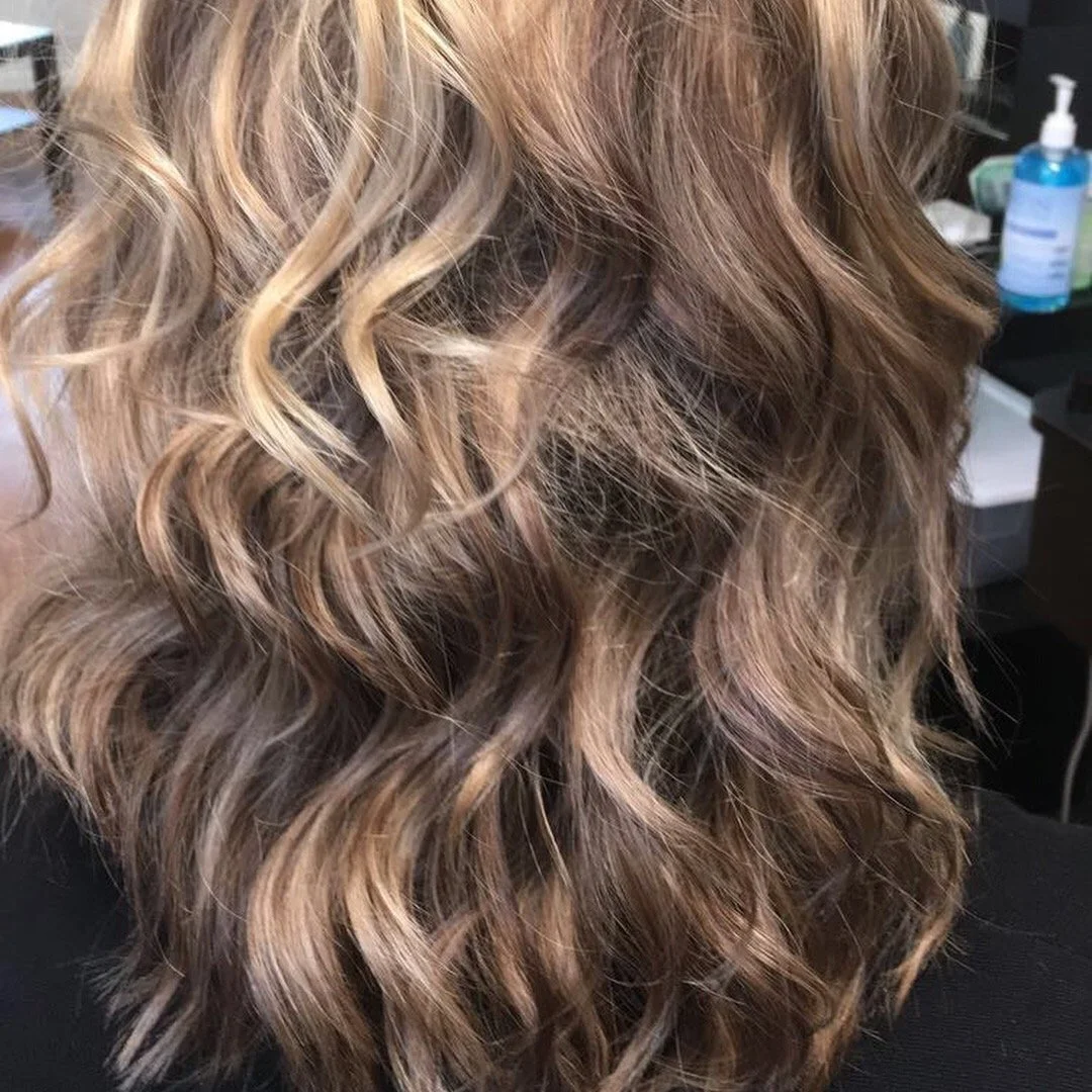 Voluminous curls for special event hairstyling.