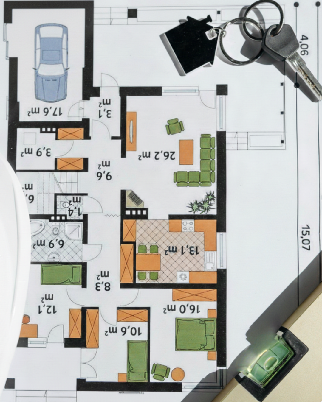 A house floorplan with a set of keys on top