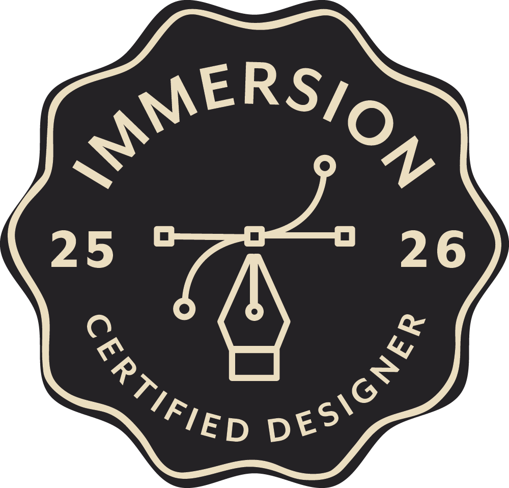 A black circular badge with beige text and design, reading 'Imprimersion Certified Designer 25-26' around a graphic of a pen nib and a compass.