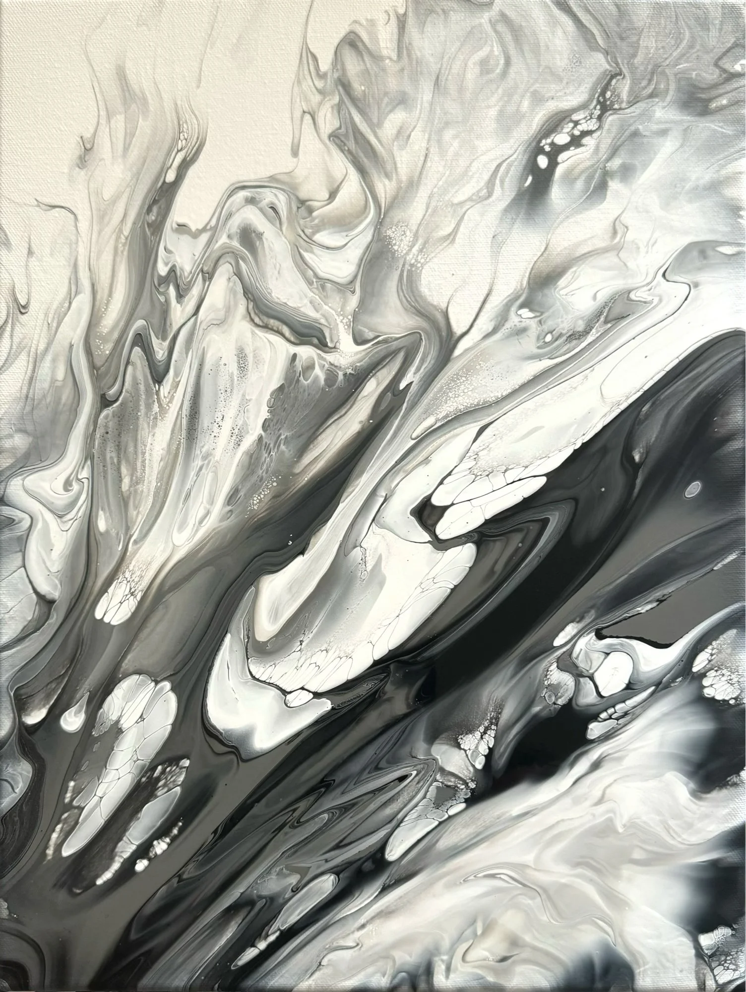 Abstract black, white, and gray marbled art with swirling patterns.