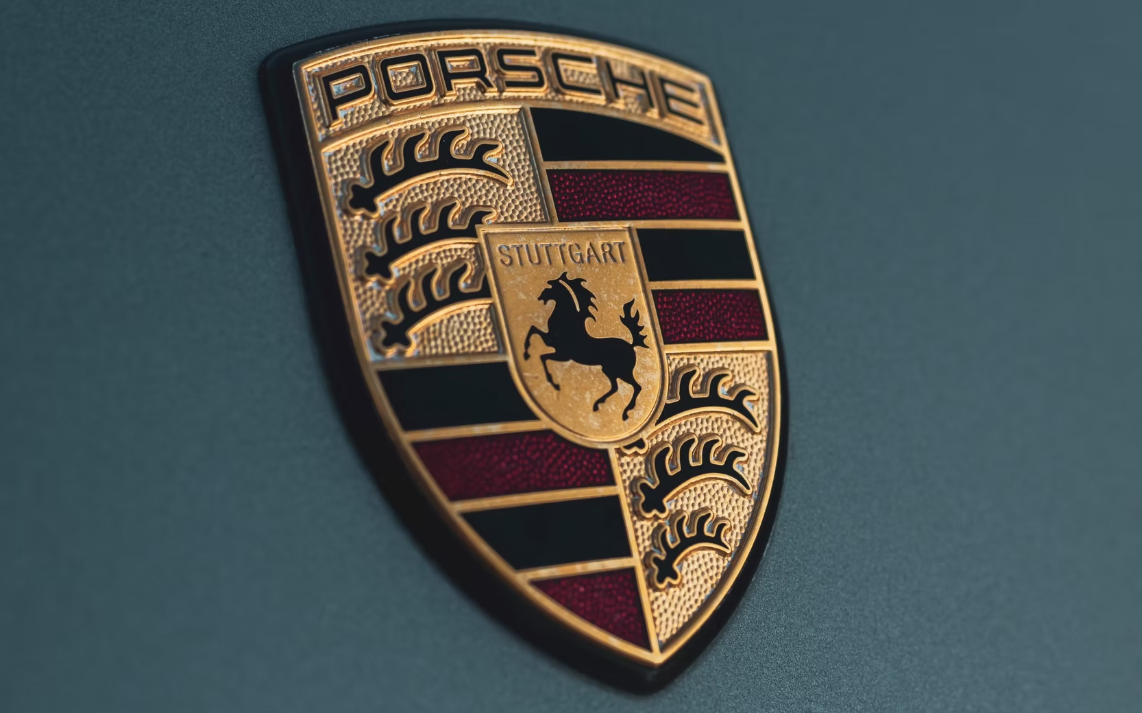 TEAL PORSCHE LOGO.png