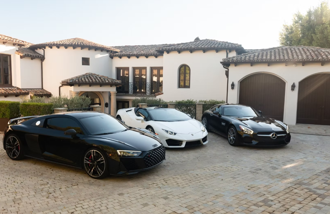 THREE CARS AND HOUSE.png