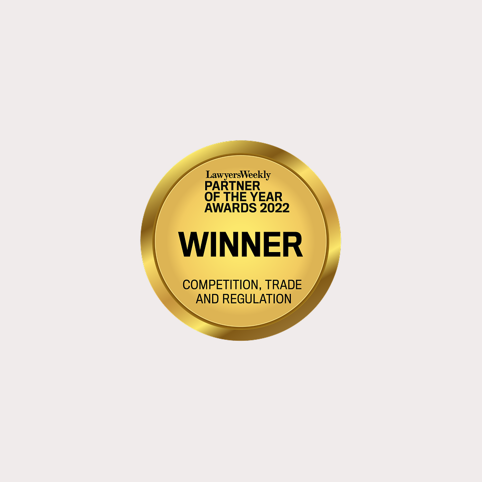 Gold award medal with black text for Lawyers Weekly Partner of the Year Awards 2022, indicating Winner for Competition, Trade, and Regulation.