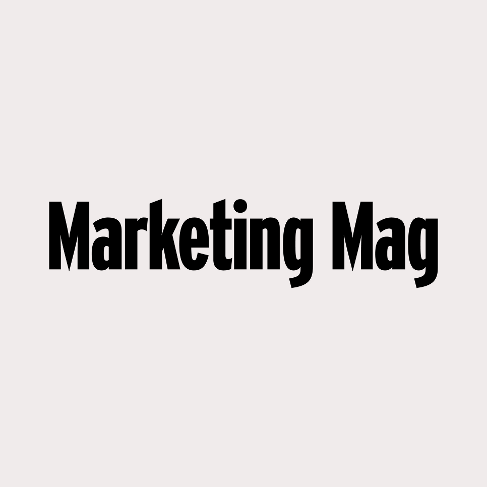 Text on a gray background reading 'Marketing Mag' in bold black letters.