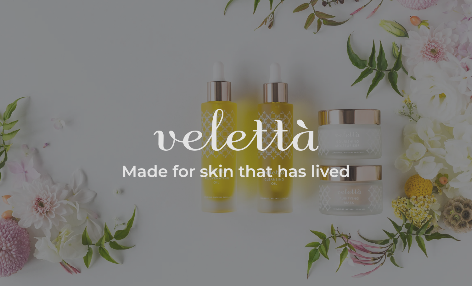 Promotion for Veletà skincare products including serums, creams, and masks, surrounded by flowers and leaves.