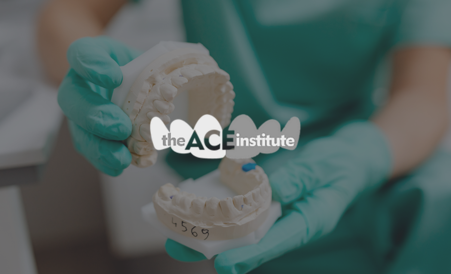 A person wearing teal gloves holding a dental model of teeth and gums, with the logo 'the ACE institute' superimposed on the image.