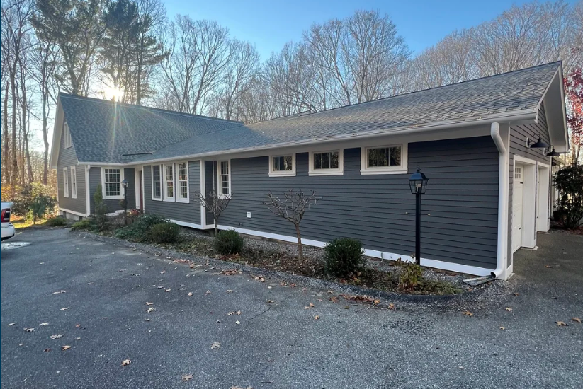 New residential asphalt shingle roof installed on single story home