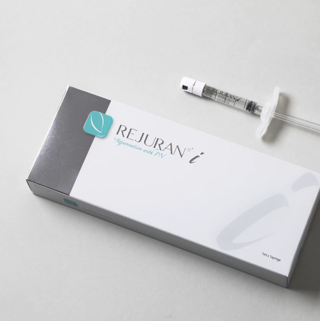 A box of Rejuvan with a syringe placed above it on a white surface.