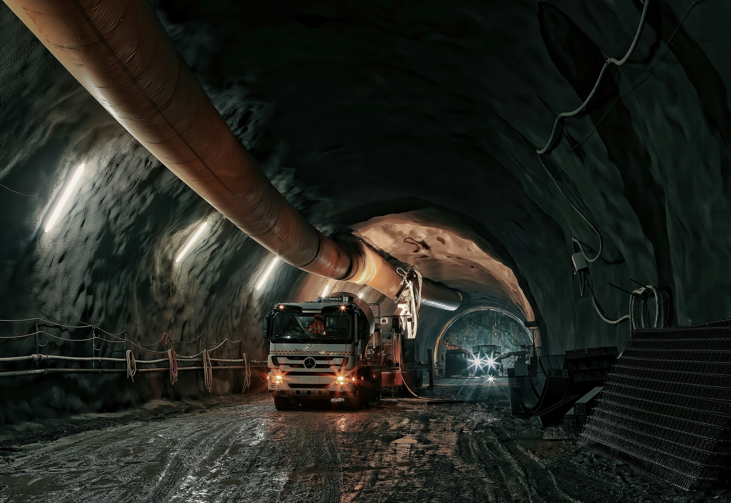 Subterranean sewer with inspection vehicle.