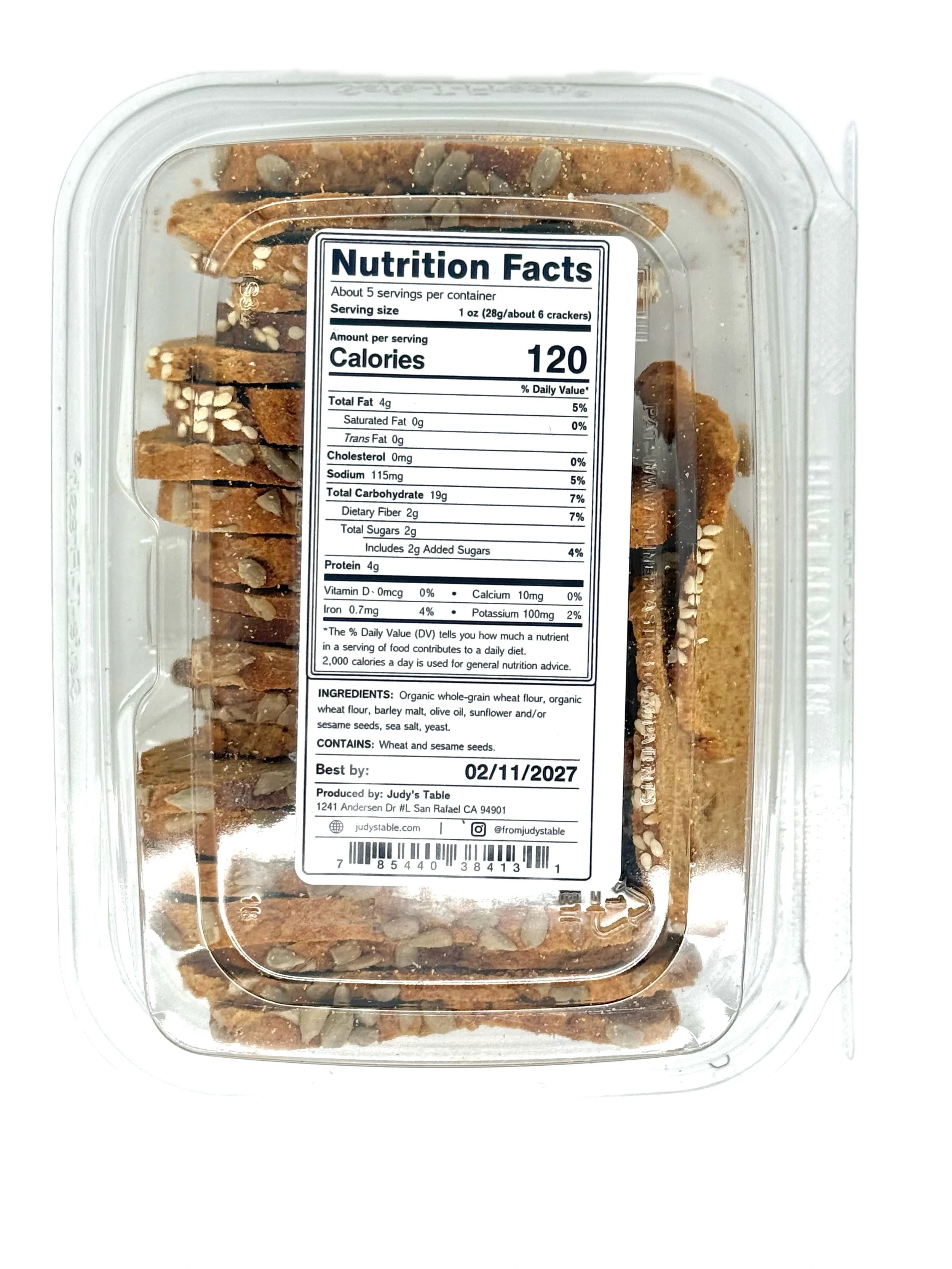 Back of Country Crackers product showing clear plastic clamshell with nutritional facts. Country Crackers use organic flours and seeds.