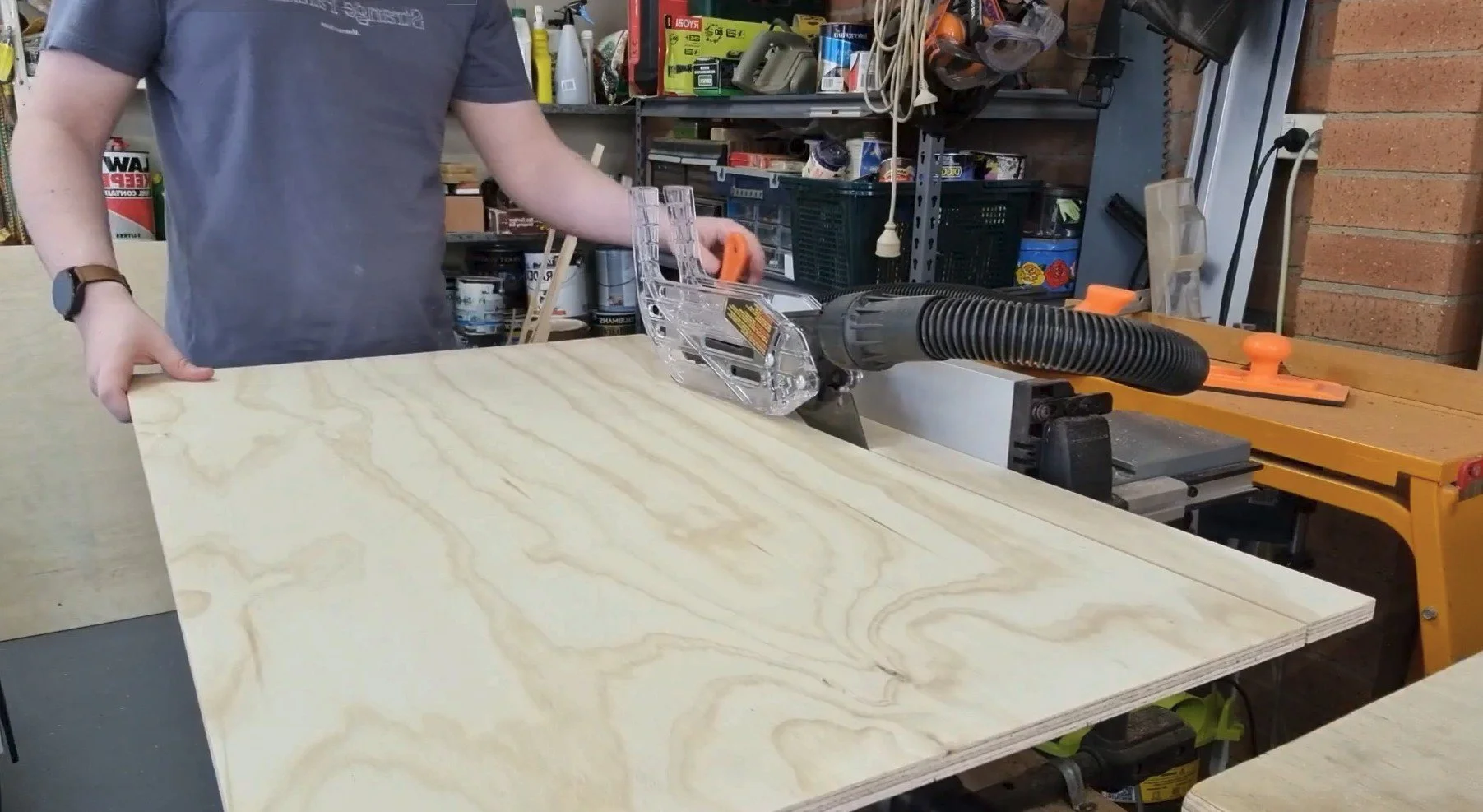 cutting strips of plywood on the table saw