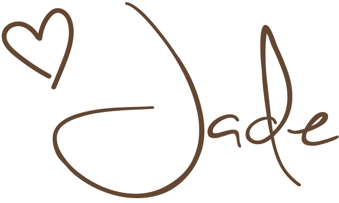 Handwritten word 'love' with a small heart above the 'L'.