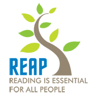 Logo of REAP with a stylized tree and the text "REAP" and "Reading is essential for all people".