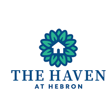 Logo with a stylized floral design and a house icon in the center, with the text 'THE HAVEN AT HEBRON' below.