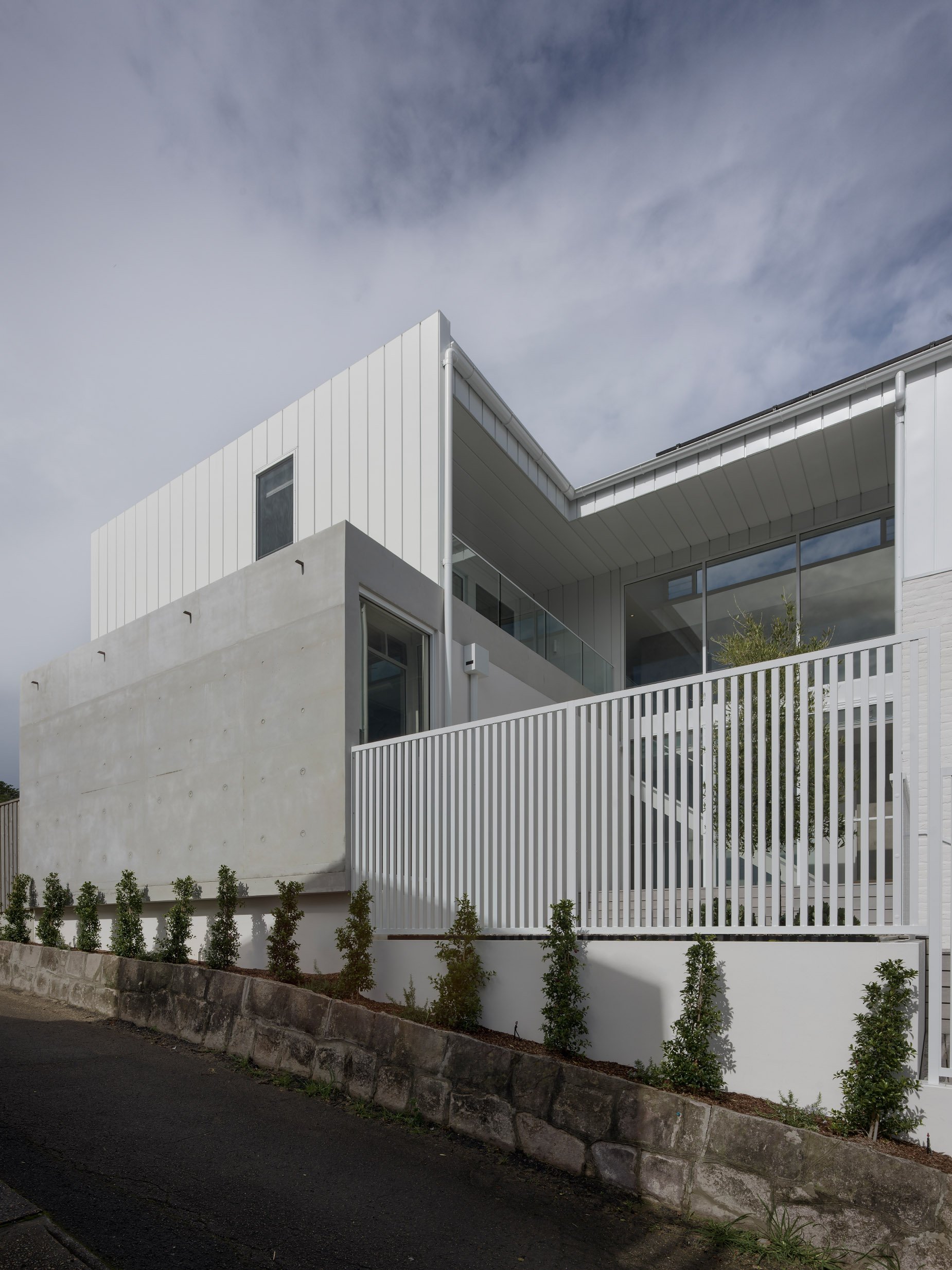 colour bond cassette cladding  surfmist off form concrete modern beach house