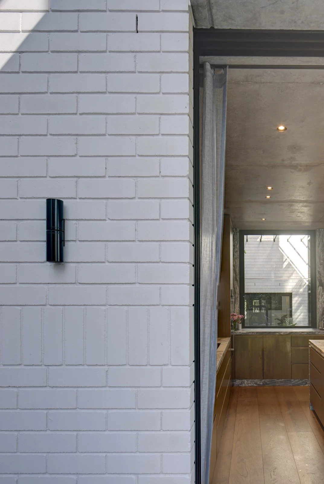 High end home renovation brick exterior timber kitchen Potts Point NSW Arte Constructions