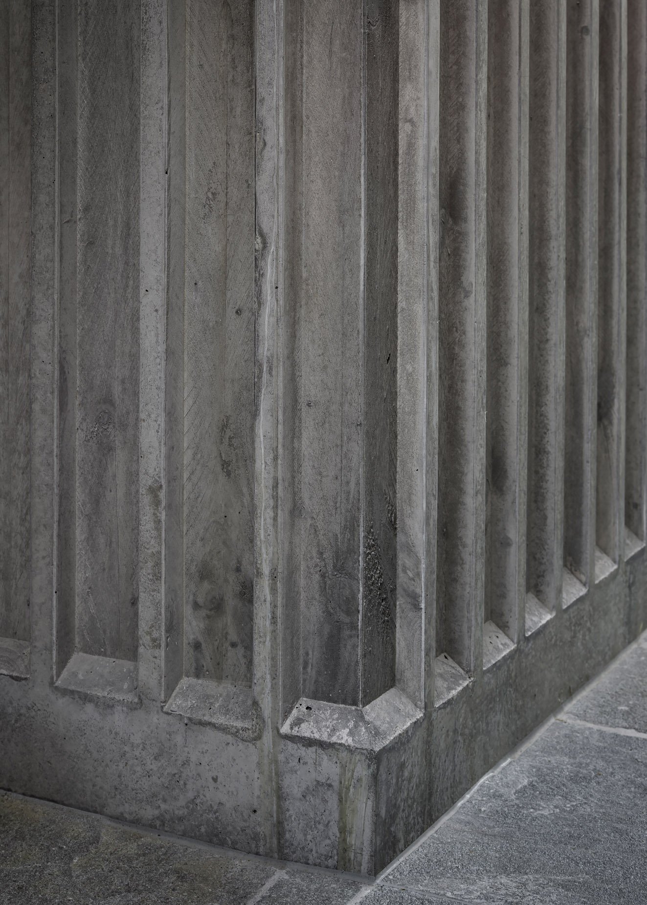 Ribbed off form concrete walls, eco out door stone
