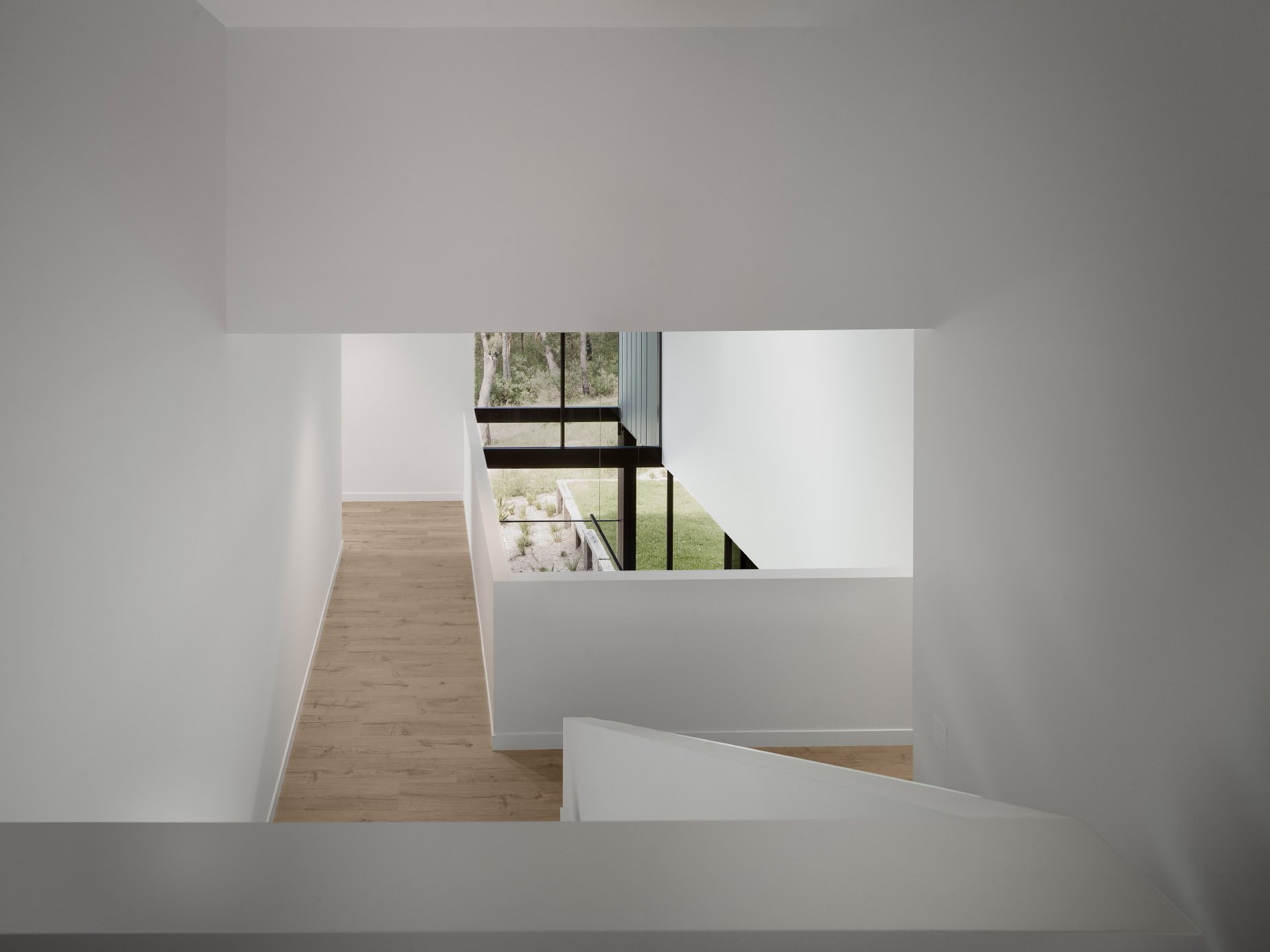 light and bright entry, oak floors, entry void glass