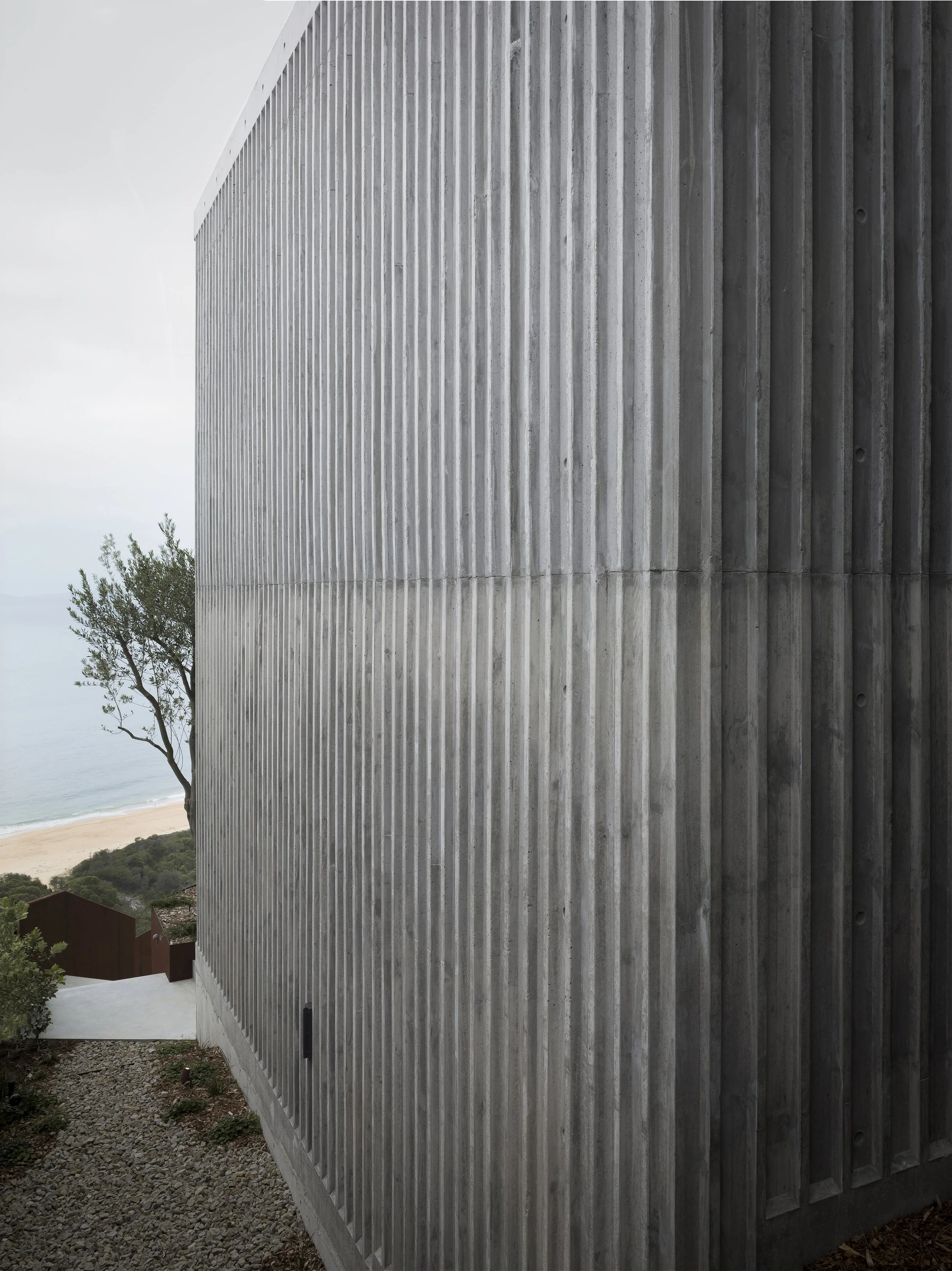 Architectural ribbed off form concrete walls BAL FZ rated central coast Killcare