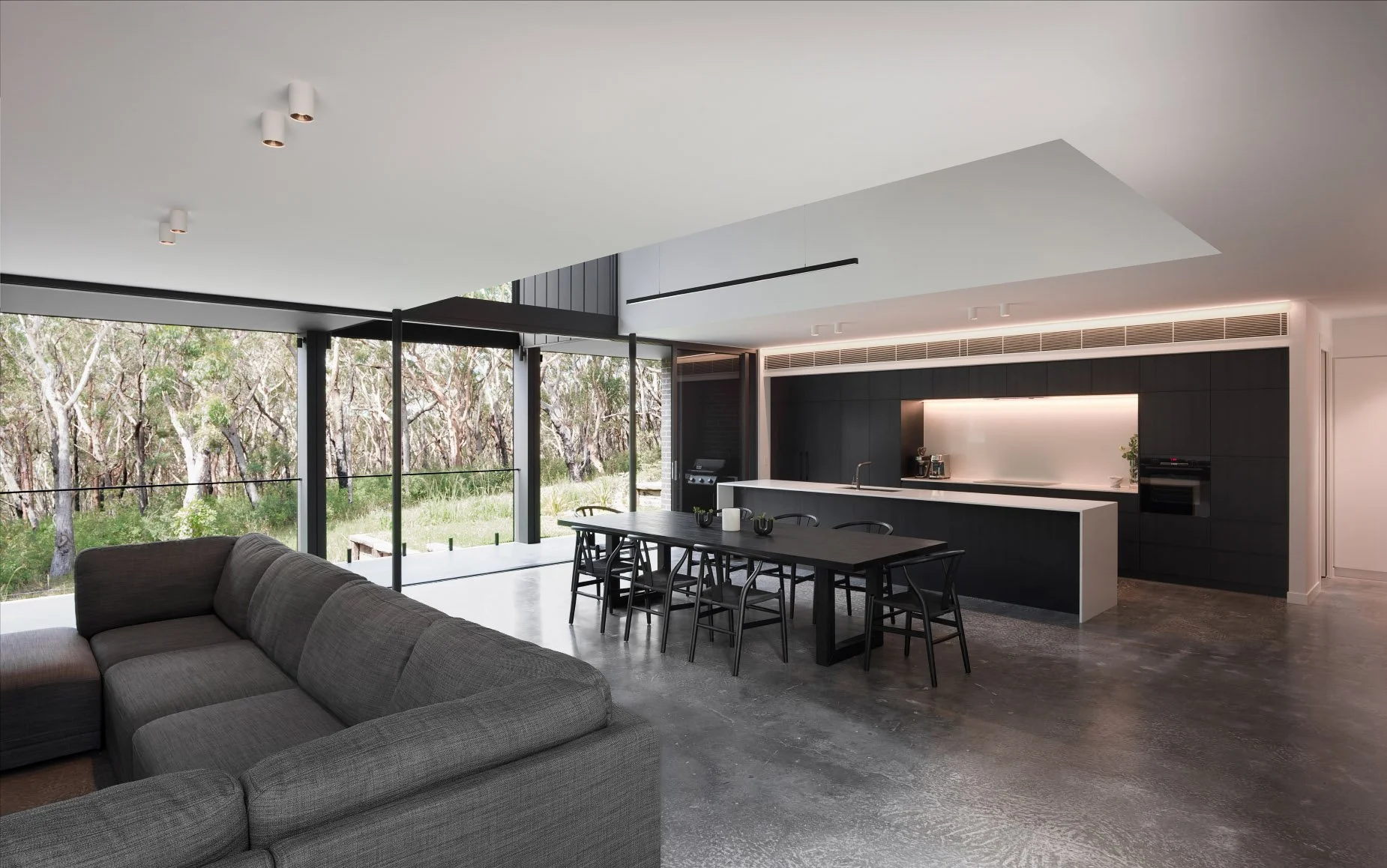 burnished concrete floors, dark kitchen with white background